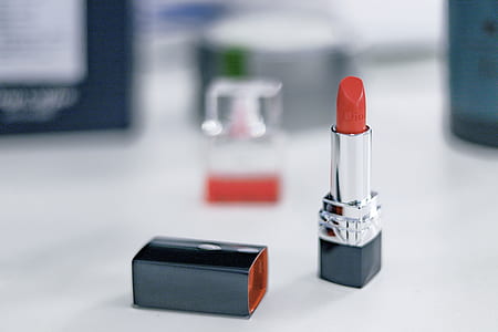 red lipstick on white surface thumbnail