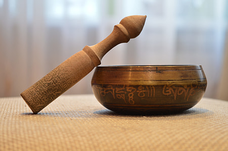 selective focus photography of brass-colored container thumbnail