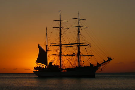 silhouette of galleon ship during sunset thumbnail
