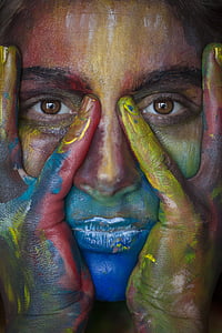 woman's face with painting thumbnail