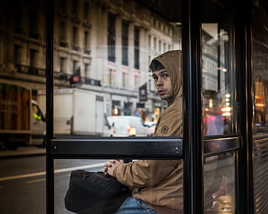 man waiting at the bus stop thumbnail