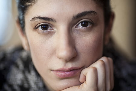 woman's face in selective focus photography thumbnail