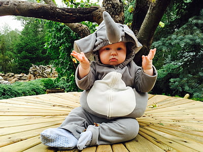 baby wearing gray elephant footie hoodie pajama thumbnail