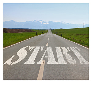 white start text on black asphalt road thumbnail