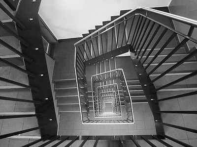 grayscale photo of spiral staircase thumbnail