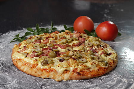 Photography of Pizza With Olive Toppings thumbnail