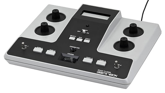white and black toy controller thumbnail