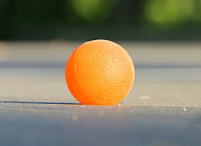 orange ball on gray board thumbnail