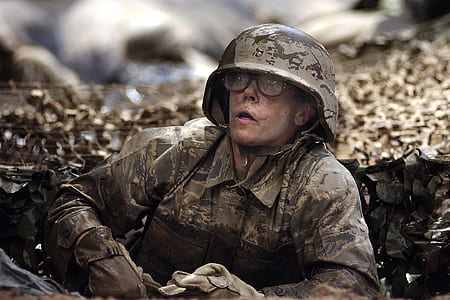 soldier wearing eyeglasses with brown frames thumbnail