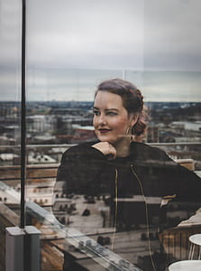 woman looking on her left side thumbnail