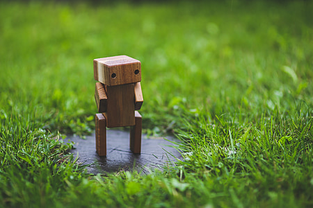 brown wooden figurine thumbnail