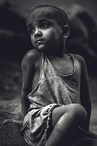 boy wearing gray tank top thumbnail