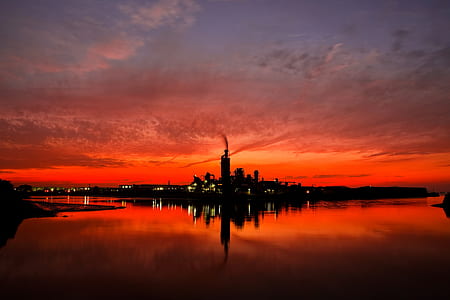 silhouette of city building during nighttime thumbnail