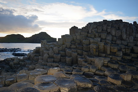 rock formation near body of water thumbnail