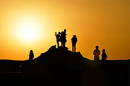 silhouette of people during golden hour thumbnail