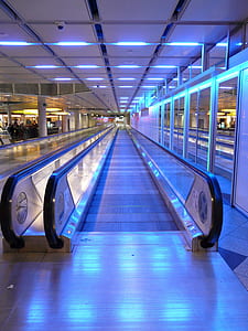 empty pathway beside glass window thumbnail