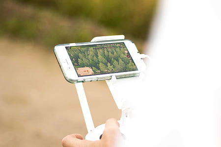 person holding a drone controller thumbnail