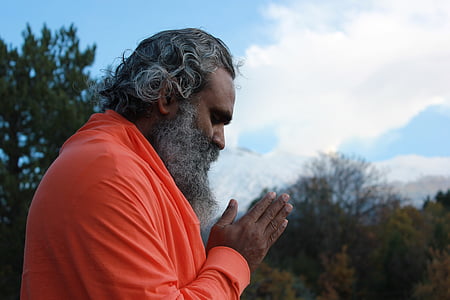 man in orange long-sleeved shirt thumbnail