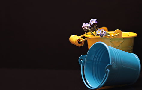 blue and yellow bucket cans thumbnail