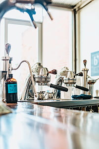 selective focus photography of commercial espresso machine thumbnail