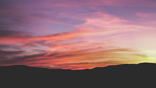 silhouette photography of mountain thumbnail
