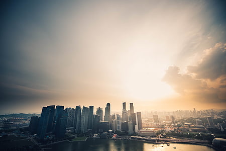 aerial view photography of highrise building under golden hour thumbnail
