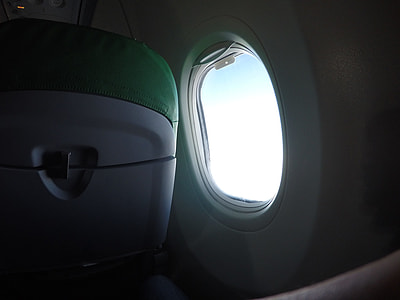 airplane window during daytime thumbnail