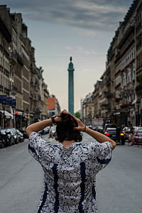 person fixing his hair in the middle of the street thumbnail