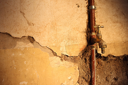 brass faucet and metal pipe photo thumbnail