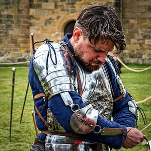 shallow focus photography of man in silver armor thumbnail