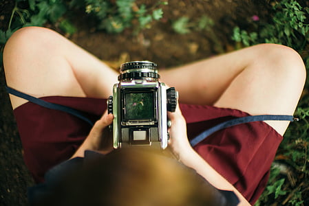 person holding video camera thumbnail