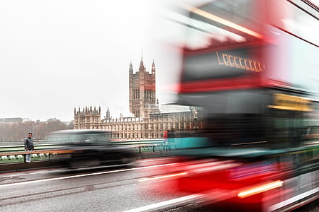 time lapse photography of red bus thumbnail