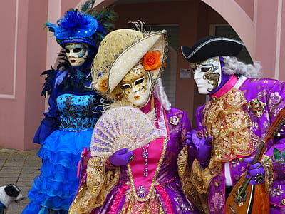 three persons wearing traditional dresses thumbnail