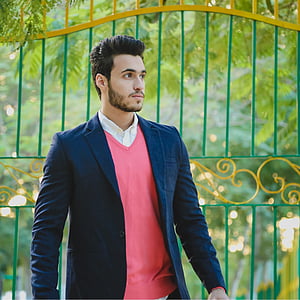 man standing near gate thumbnail