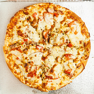 cheese pizza on white cardboard box thumbnail
