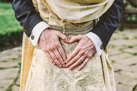 person holding floral dress thumbnail