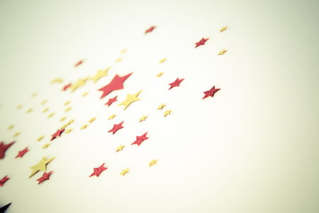 close-up photography of yellow and red star decor thumbnail
