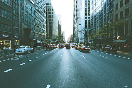 street photography of cars on road thumbnail