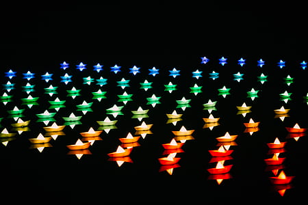 assorted-color star string lights turned on at night thumbnail