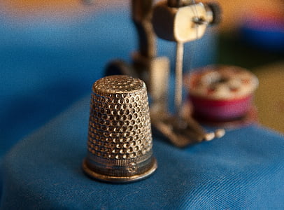 silver-colored thimble thumbnail
