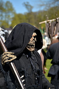 person in grim reaper costume thumbnail