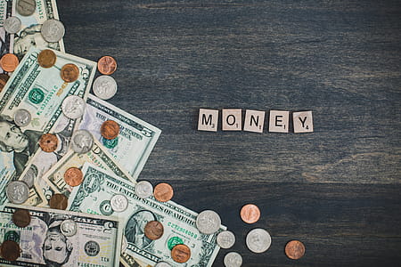 Money Spelled Out With Cash Photo thumbnail