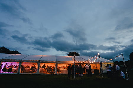 group of people gathering inside the tent thumbnail
