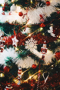 Green Christmas Tree With String Lights and Hanging Decors thumbnail