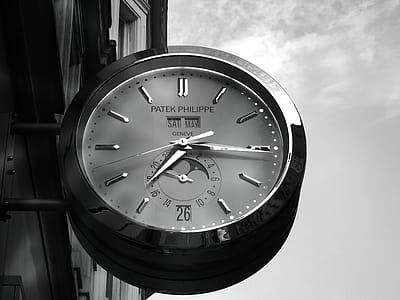 Gray Patek Philippe Clock Displaying 7:16 thumbnail