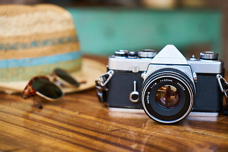 photo of black and gray DSLR camera thumbnail