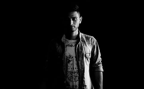 grayscale man in gray jacket thumbnail