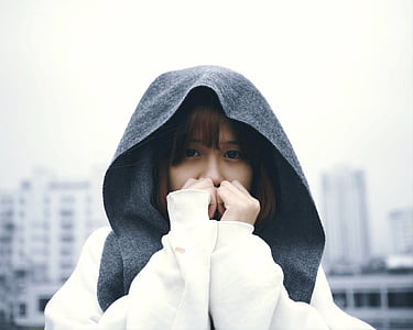 woman in white and black hoodie thumbnail