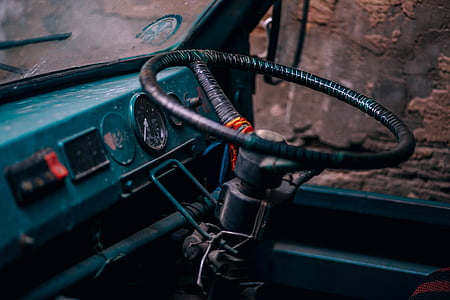 classic black car steering wheel thumbnail