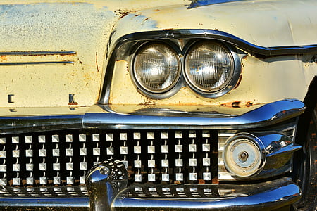 closeup photography of classic yellow car thumbnail